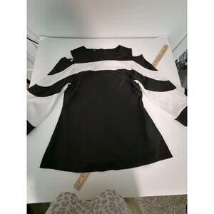 black and white cold shoulder tunic size MED